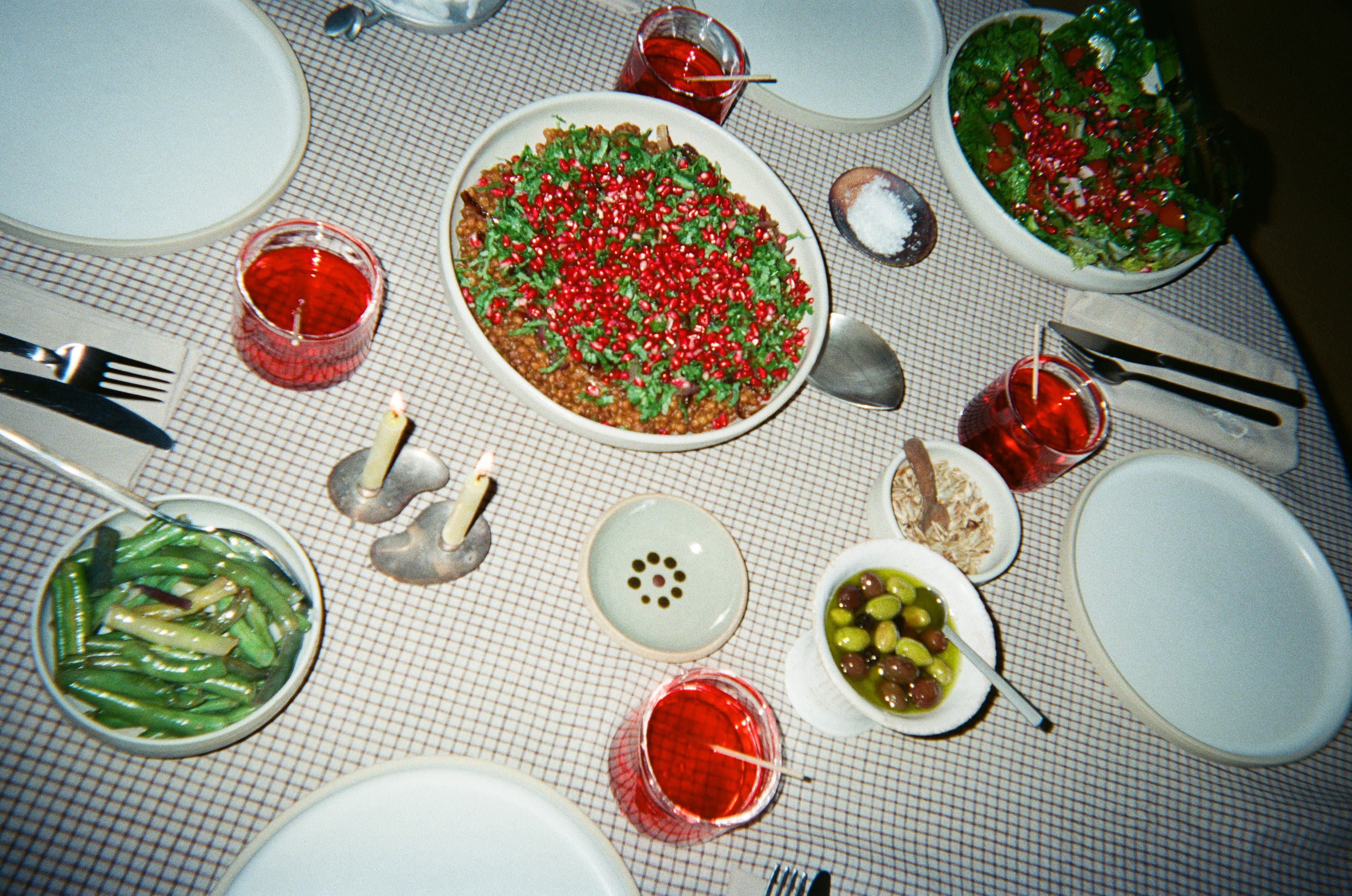 Family dinner table with homemade dishes and warm lighting